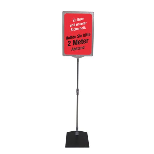 Plakatrahmenständer Set DIN A4 mit rotem Plakat mit Aufschrift "Zu Ihrer und unserer Sicherheit: Halten Sie bitte 2 Meter Abstand"